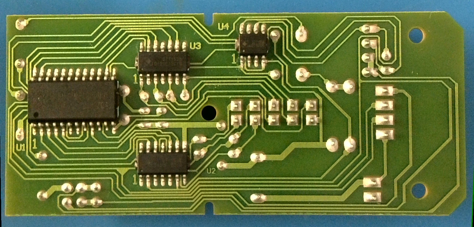 The back of the OWI Edge USB Robot arm control board with the ICs