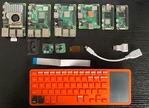Raspberry Pi models and Camera modules lined up for testing